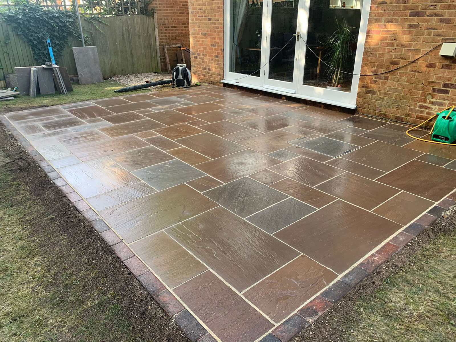 Sandstone patio by Stone Landscapes, Woking, Surrey