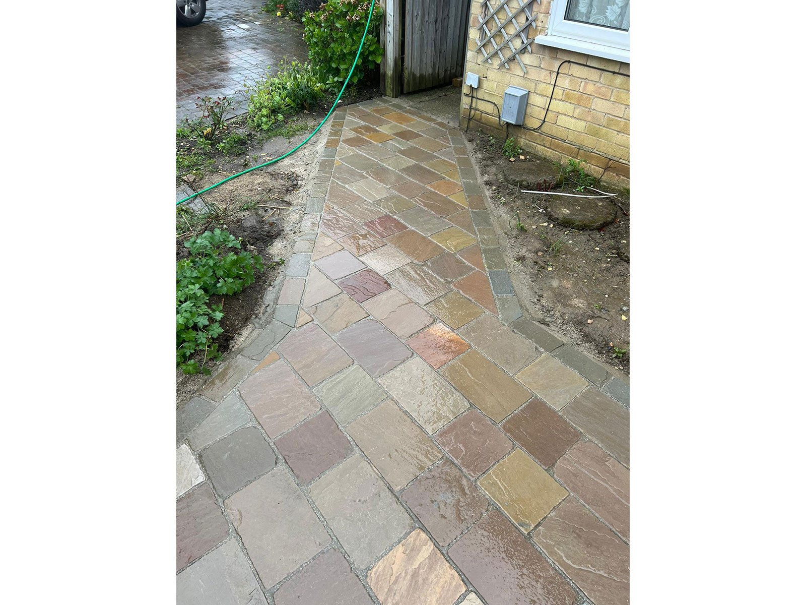 Sandstone patio by Stone Landscapes, Woking, Surrey