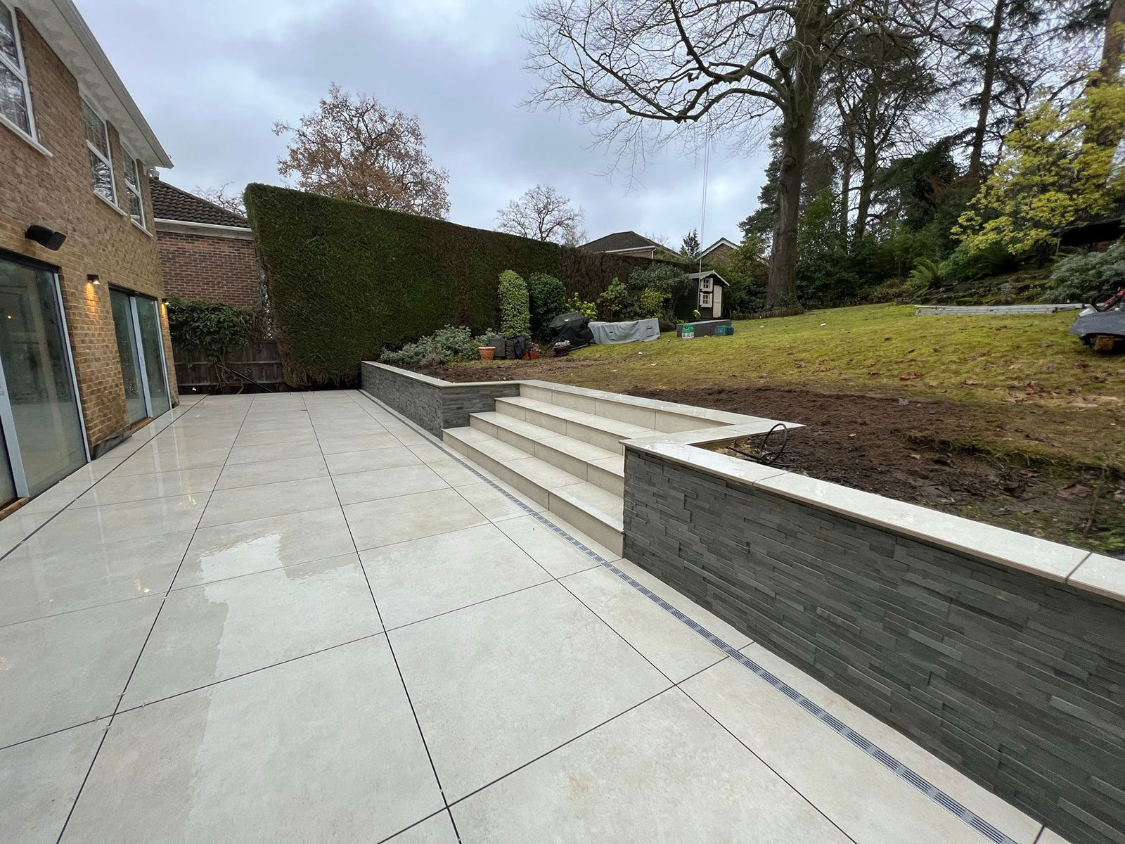 Porcelain patio by Stone Landscapes, Woking, Surrey