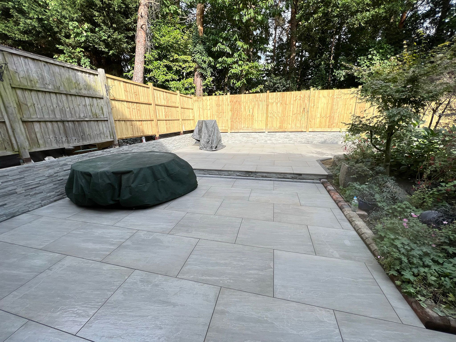 Porcelain patio by Stone Landscapes, Woking, Surrey